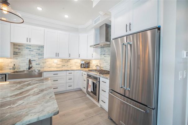 Interior, Kitchen, Recessed Lighting, Stainless Steel Appliances, Wood Texture Flooring