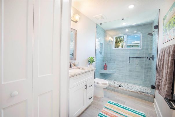 Bathroom, Glass Shower, Interior, Recessed Lighting, Wood Texture Flooring