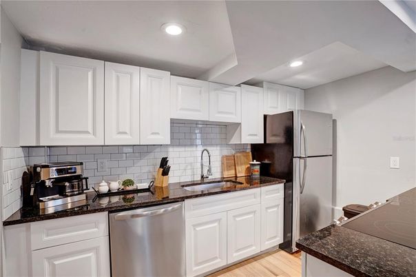 Interior, Kitchen, Recessed Lighting, Stainless Steel Appliances, Wood Texture Flooring