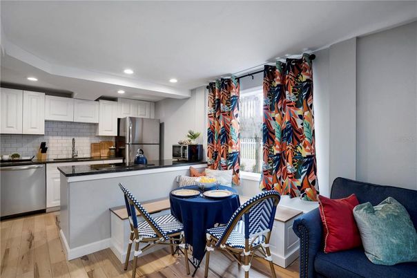 Dining room, Interior, Kitchen, Recessed Lighting, Stainless Steel Appliances, Wood Texture Flooring