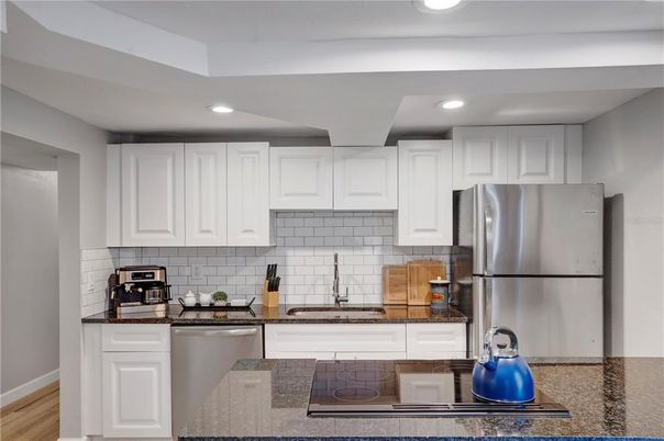 Interior, Kitchen, Recessed Lighting, Stainless Steel Appliances, Wood Texture Flooring