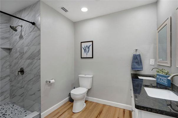Bathroom, Interior, Marble Walls, Recessed Lighting, Wood Texture Flooring