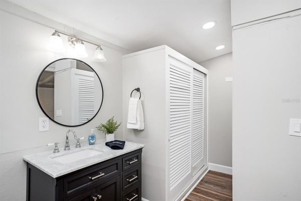 Bathroom, Dual Sink Vanities, Interior, Recessed Lighting, Wood Texture Flooring
