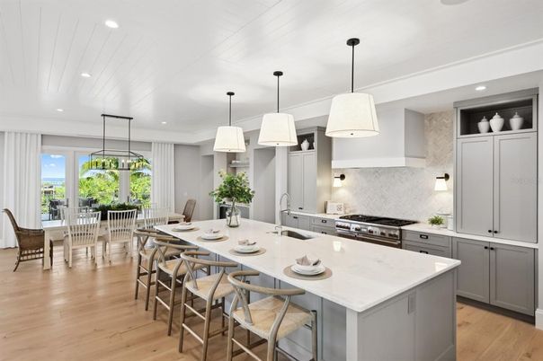 Dining room, Interior, Kitchen, Pendant Lights, Recessed Lighting, Stainless Steel Appliances, Wood Texture Flooring