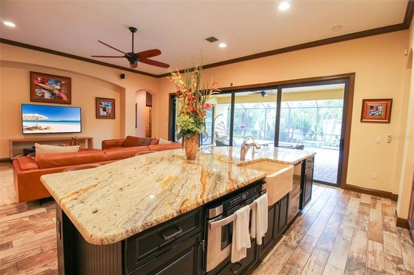 Interior, Kitchen, Wood Texture Flooring, Recessed Lighting, Living room, Chandelier, Pendant Lights