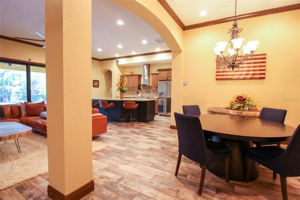 Interior, Kitchen, Wood Texture Flooring, Recessed Lighting, Living room, Dining room, Chandelier, Stainless Steel Appliances, Pendant Lights
