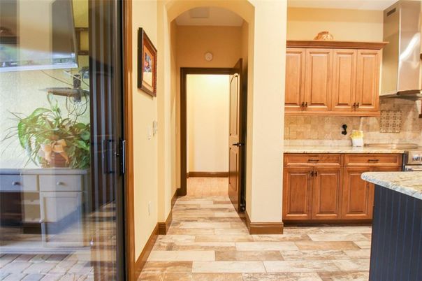 Interior, Kitchen, Wood Texture Flooring, Recessed Lighting, Stainless Steel Appliances, Ceramic Tile