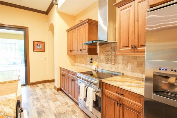 Interior, Kitchen, Wood Texture Flooring, Recessed Lighting, Wooden Beams, Stainless Steel Appliances, Ceramic Tile