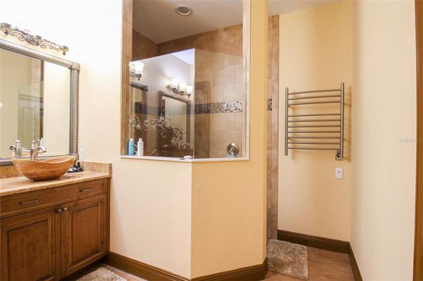 Interior, Bathroom, Wood Texture Flooring, Recessed Lighting, Glass Shower, Ceramic Tile