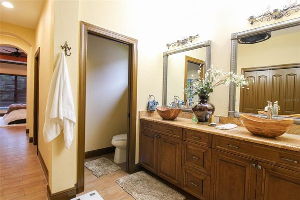 Interior, Bathroom, Wood Texture Flooring, Recessed Lighting, Ceramic Tile, Dual Sink Vanities