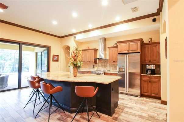 Interior, Kitchen, Wood Texture Flooring, Recessed Lighting, Stainless Steel Appliances