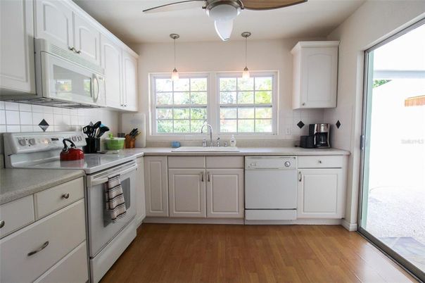 Interior, Kitchen, Wood Texture Flooring, Stainless Steel Appliances, Pendant Lights