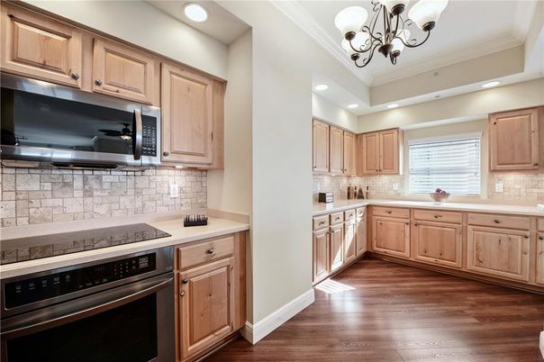 Chandelier, Interior, Kitchen, Recessed Lighting, Stainless Steel Appliances, Wood Texture Flooring