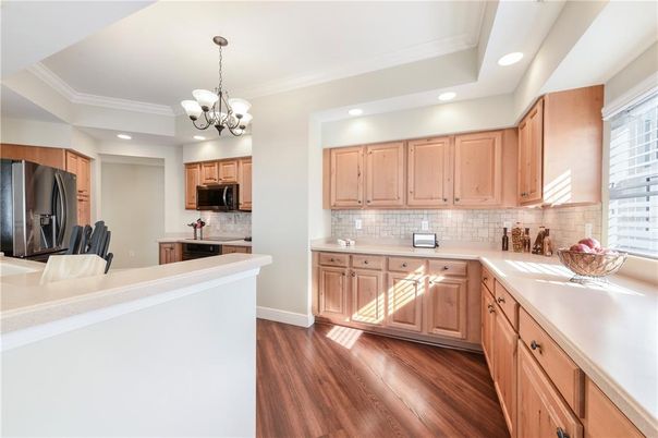 Chandelier, Interior, Kitchen, Recessed Lighting, Stainless Steel Appliances, Wood Texture Flooring