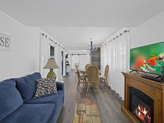 Chandelier, Dining room, Fireplace, Interior, Living room, Wood Texture Flooring