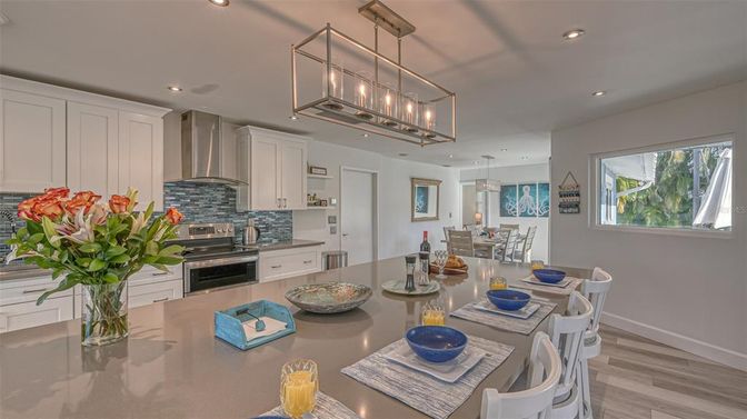 Dining room, Interior, Kitchen, Pendant Lights, Recessed Lighting, Stainless Steel Appliances, Wood Texture Flooring