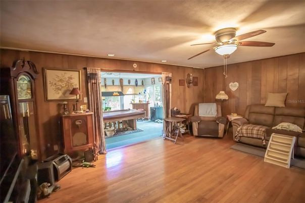 Billiard Table, Game Room, Interior, Living room, Piano, Recessed Lighting, Wood Texture Flooring, Wooden Walls