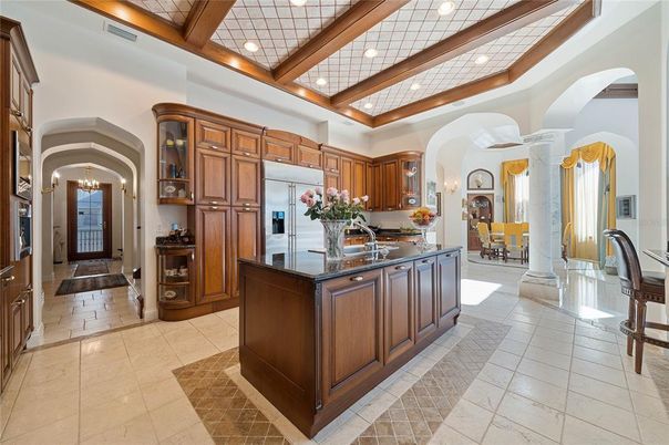 Chandelier, Dining room, Interior, Kitchen, Pendant Lights, Recessed Lighting, Stainless Steel Appliances, Wooden Beams