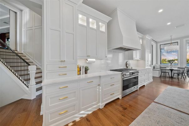 Dining room, Interior, Kitchen, Pendant Lights, Recessed Lighting, Stainless Steel Appliances, Wood Texture Flooring