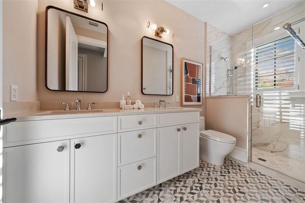 Bathroom, Dual Sink Vanities, Glass Shower, Interior, Marble Walls, Recessed Lighting