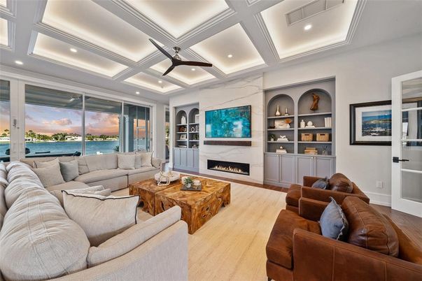 Fireplace, Interior, Living room, Recessed Lighting, Water, Wood Texture Flooring