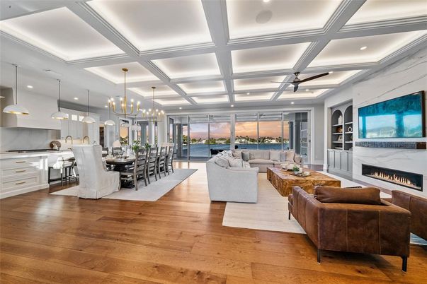 Dining room, Fireplace, Interior, Kitchen, Living room, Pendant Lights, Recessed Lighting, Water, Wood Texture Flooring