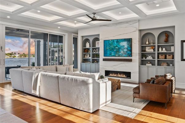 Fireplace, Interior, Living room, Marble Walls, Recessed Lighting, Wood Texture Flooring