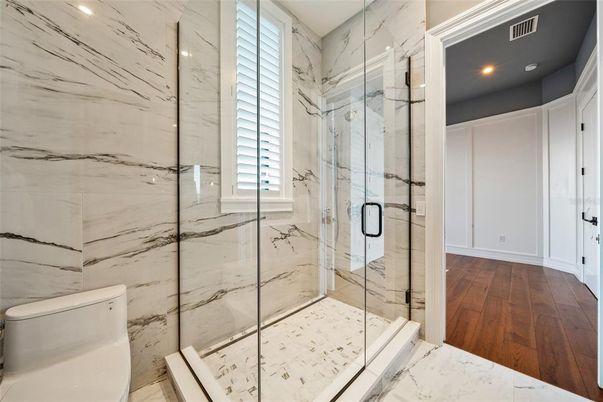 Bathroom, Glass Shower, Interior, Marble, Marble Walls, Recessed Lighting, Wood Texture Flooring
