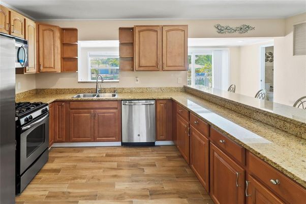 Interior, Kitchen, Recessed Lighting, Stainless Steel Appliances, Wood Texture Flooring