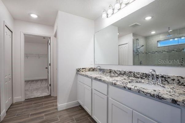 Bathroom, Dual Sink Vanities, Interior, Recessed Lighting, Wood Texture Flooring