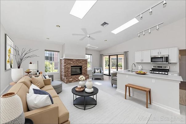 Fireplace, Interior, Kitchen, Living room, Recessed Lighting, Stainless Steel Appliances, Wood Texture Flooring