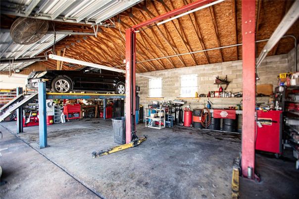 Garage, Interior, Stone Walls, Wooden Beams
