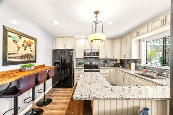 Interior, Kitchen, Pendant Lights, Recessed Lighting, Stainless Steel Appliances, Wood Texture Flooring