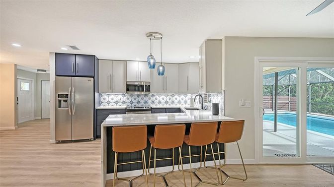 Interior, Kitchen, Pendant Lights, Recessed Lighting, Stainless Steel Appliances, Wood Texture Flooring