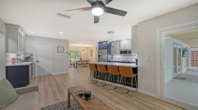 Dining room, Interior, Kitchen, Pendant Lights, Recessed Lighting, Stainless Steel Appliances, Wood Texture Flooring