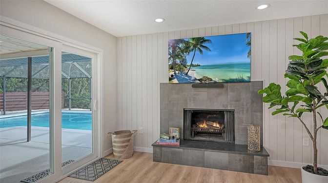 Fireplace, Interior, Pool, Recessed Lighting, Water, Wood Texture Flooring