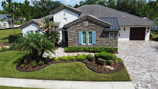 Attached, Exterior, Facade, Brick Facade, Mediterranean