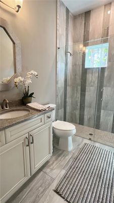 Bathroom, Glass Shower, Interior, Wood Texture Flooring