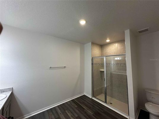 Bathroom, Glass Shower, Interior, Recessed Lighting, Wood Texture Flooring