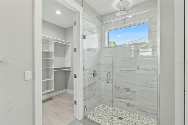 Bathroom, Glass Shower, Interior, Marble Walls, Recessed Lighting, Walk-in Closets
