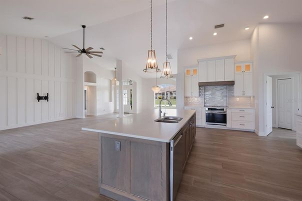 Interior, Kitchen, Pendant Lights, Recessed Lighting, Stainless Steel Appliances, Wood Texture Flooring