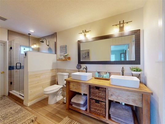 Bathroom, Dual Sink Vanities, Glass Shower, Interior, Wood Texture Flooring