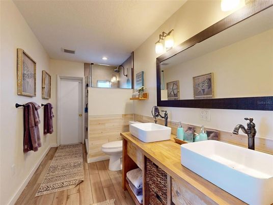 Bathroom, Dual Sink Vanities, Interior, Recessed Lighting, Wood Texture Flooring
