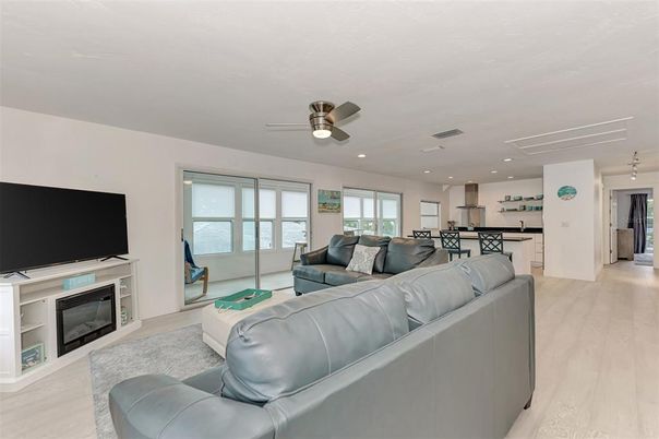 Fireplace, Interior, Kitchen, Living room, Recessed Lighting, Wood Texture Flooring