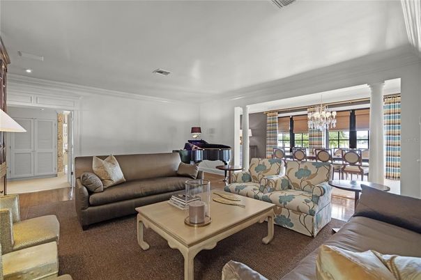 Chandelier, Dining room, Interior, Living room, Piano, Recessed Lighting, Wood Texture Flooring