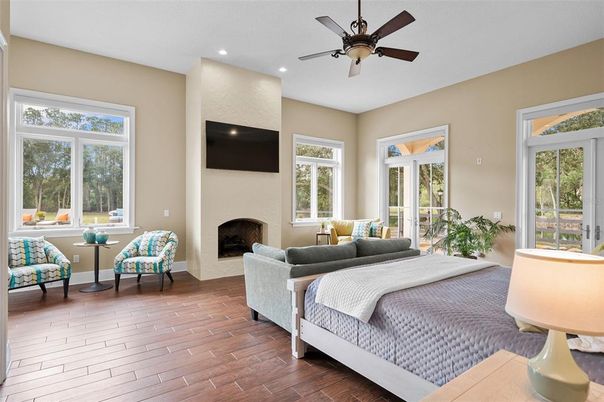 Bedroom, Fireplace, Interior, Recessed Lighting, Wood Texture Flooring
