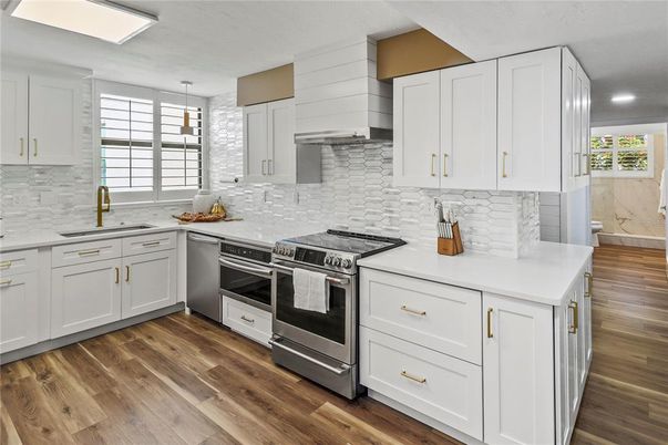 Interior, Kitchen, Pendant Lights, Recessed Lighting, Stainless Steel Appliances, Wood Texture Flooring