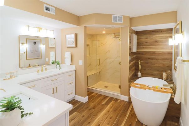 Bathroom, Dual Sink Vanities, Free Standing Baths, Glass Shower, Interior, Marble Walls, Wood Texture Flooring