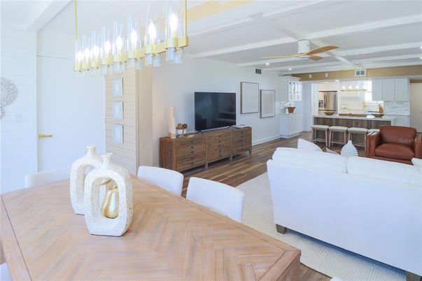 Dining room, Interior, Kitchen, Living room, Pendant Lights, Recessed Lighting, Stainless Steel Appliances, Wood Texture Flooring