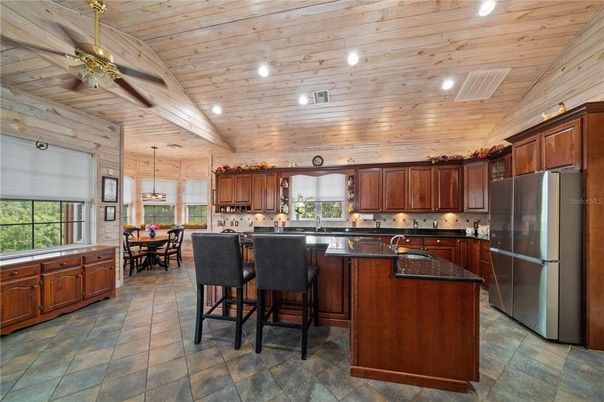 Dining room, Interior, Kitchen, Pendant Lights, Recessed Lighting, Stainless Steel Appliances, Wooden Ceilings